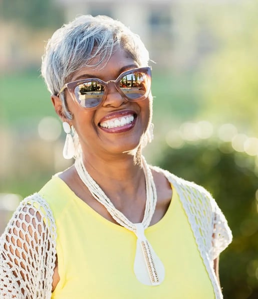 woman smiling using a FL home warranty